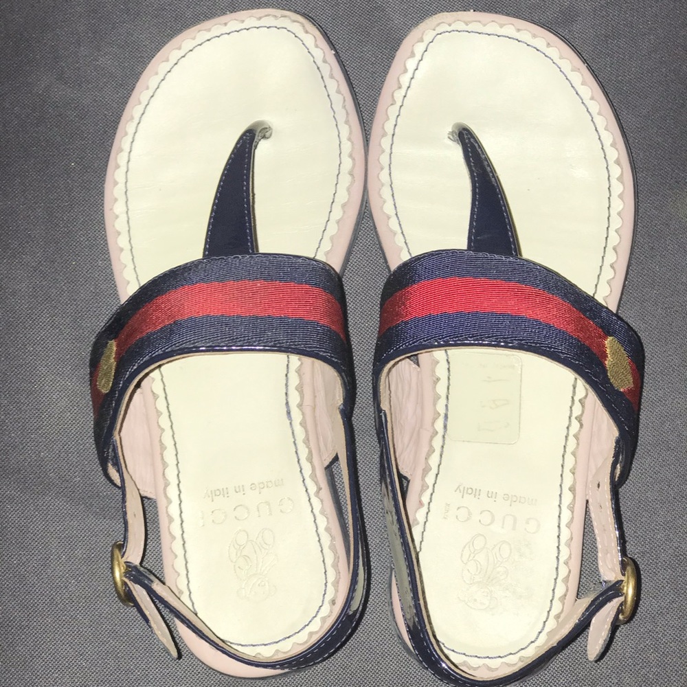 Kids Gucci thong sandals.